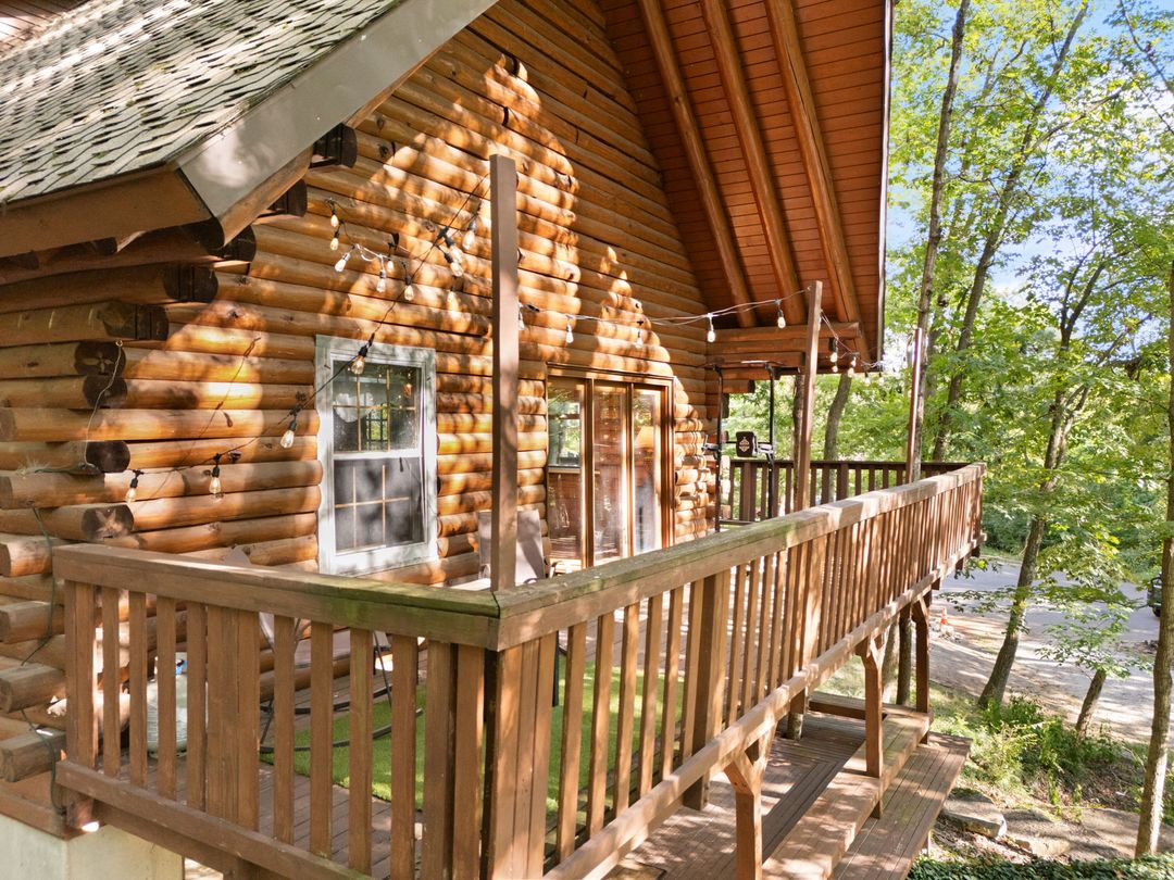 The upper-level deck overlooking the trees