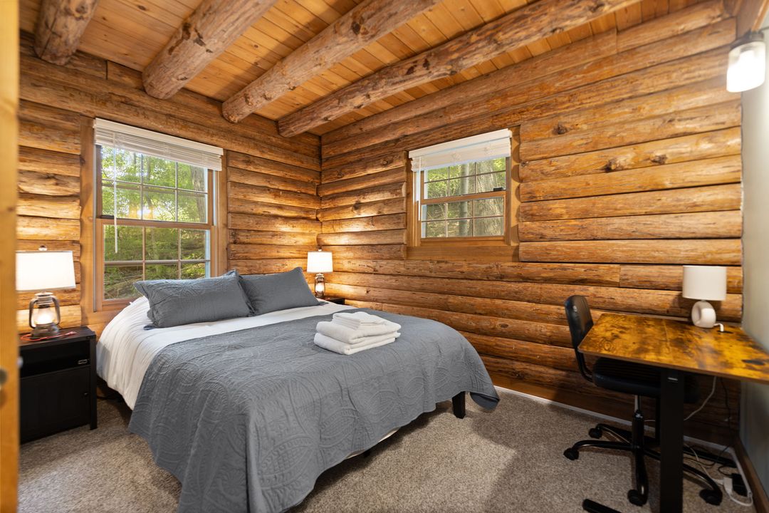 Guest bedroom with a dedicated workspace