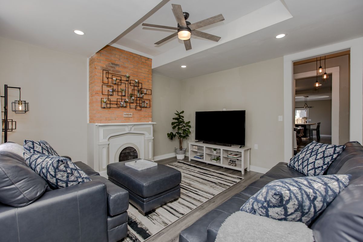 The bright living room with a sectional sofa