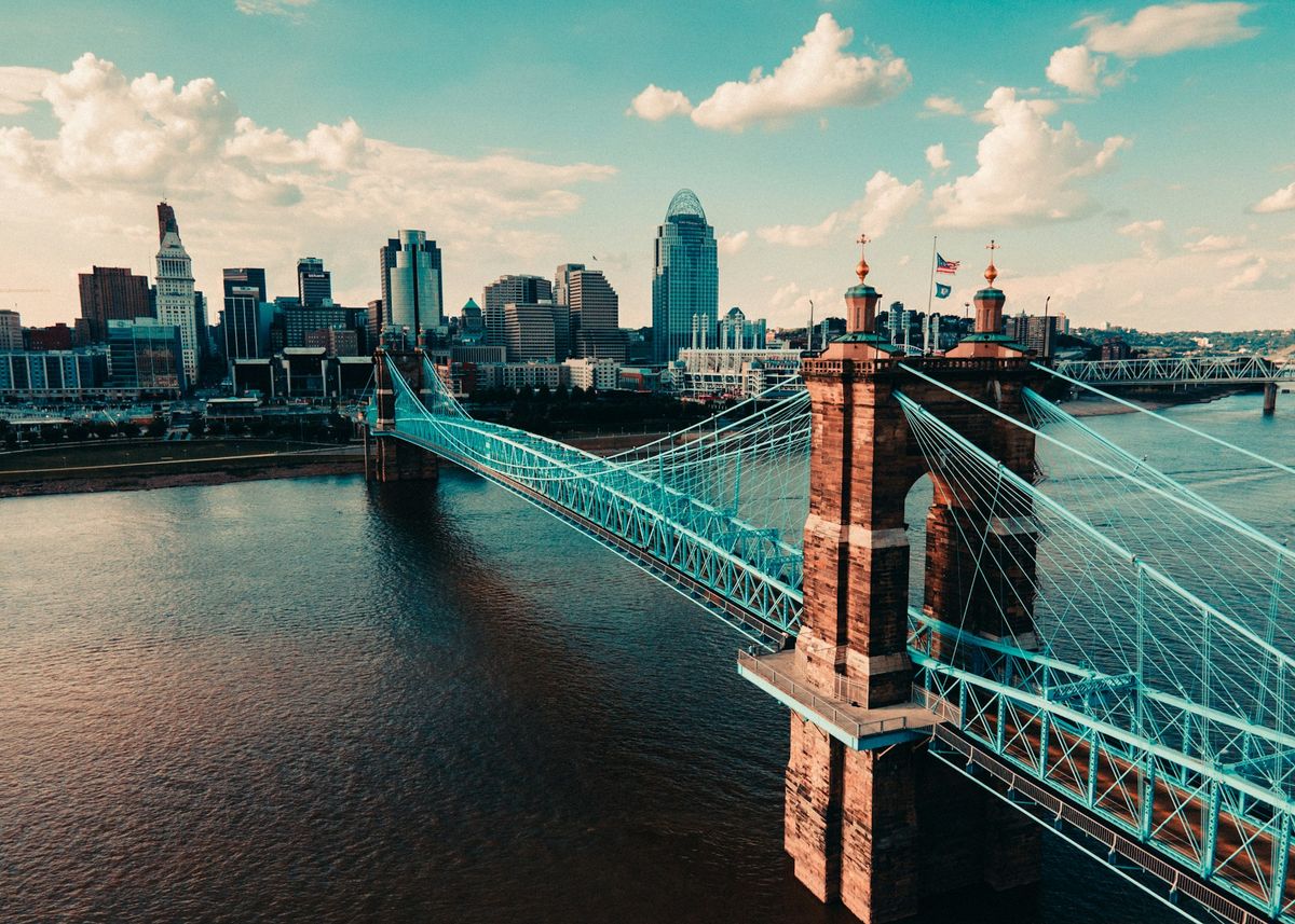 The Roebling Suspension Bridge over the Ohio River, with the downtown Cincinnati skyline behind it